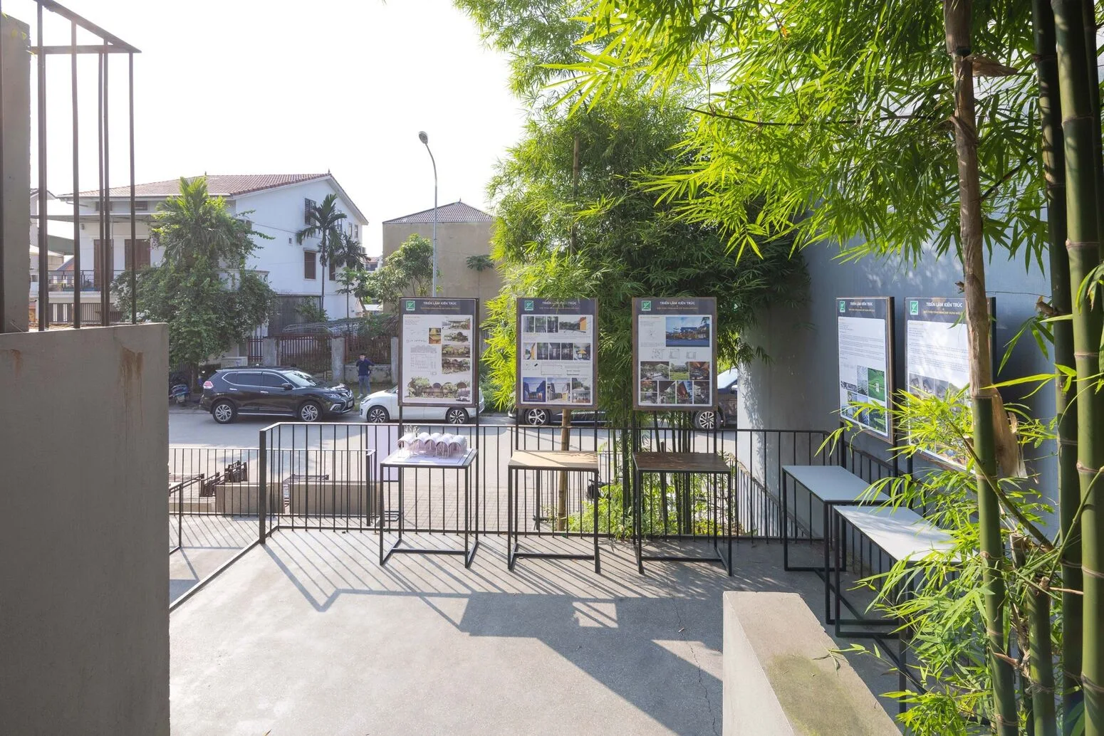 From the street — a cool green bamboo façade