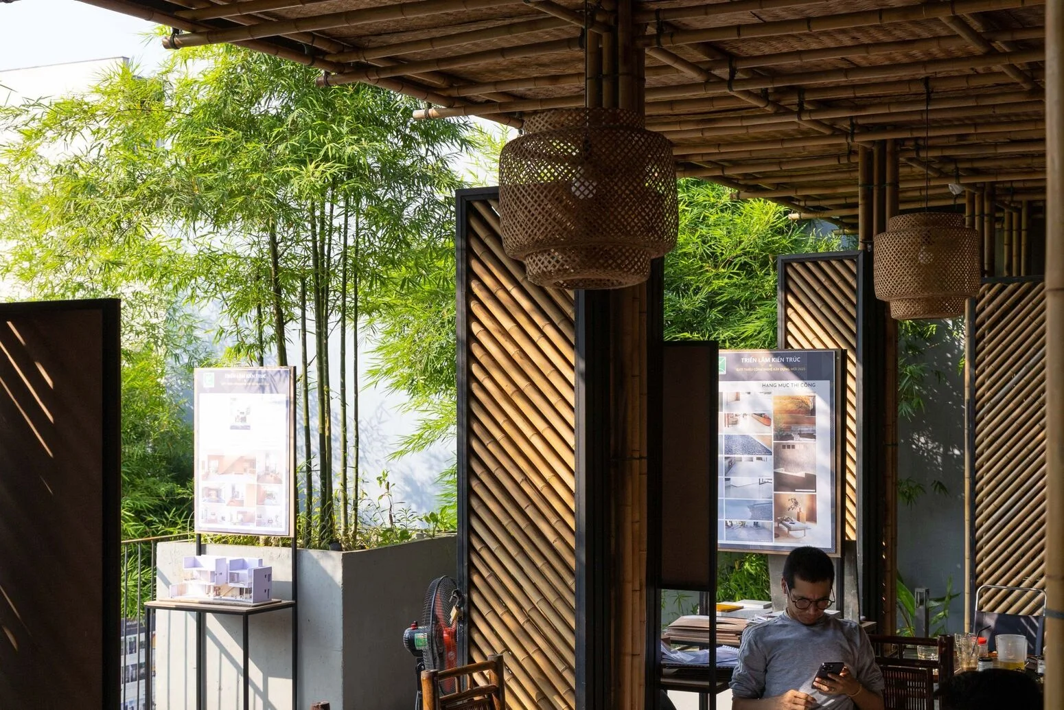 A seat amid greenery, a guest relaxing