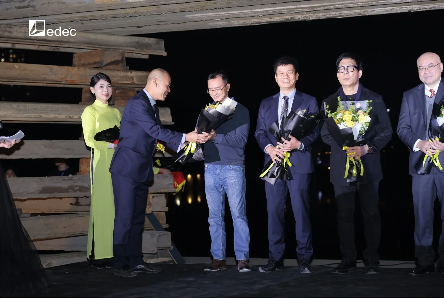The evening tribute — presenting flowers on stage
