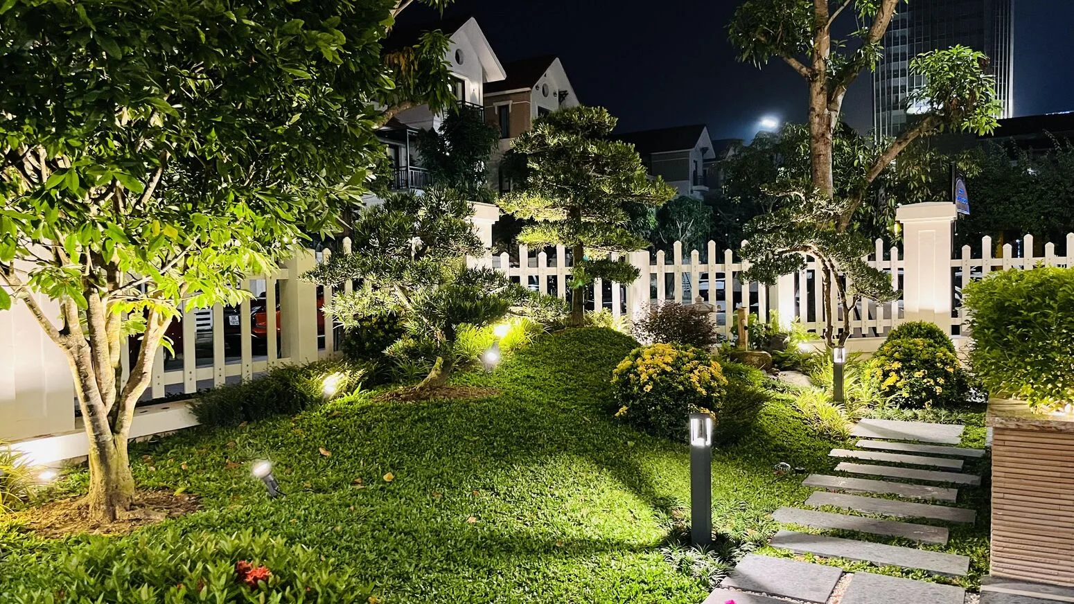 The night garden — spotlights on canopy and lawn