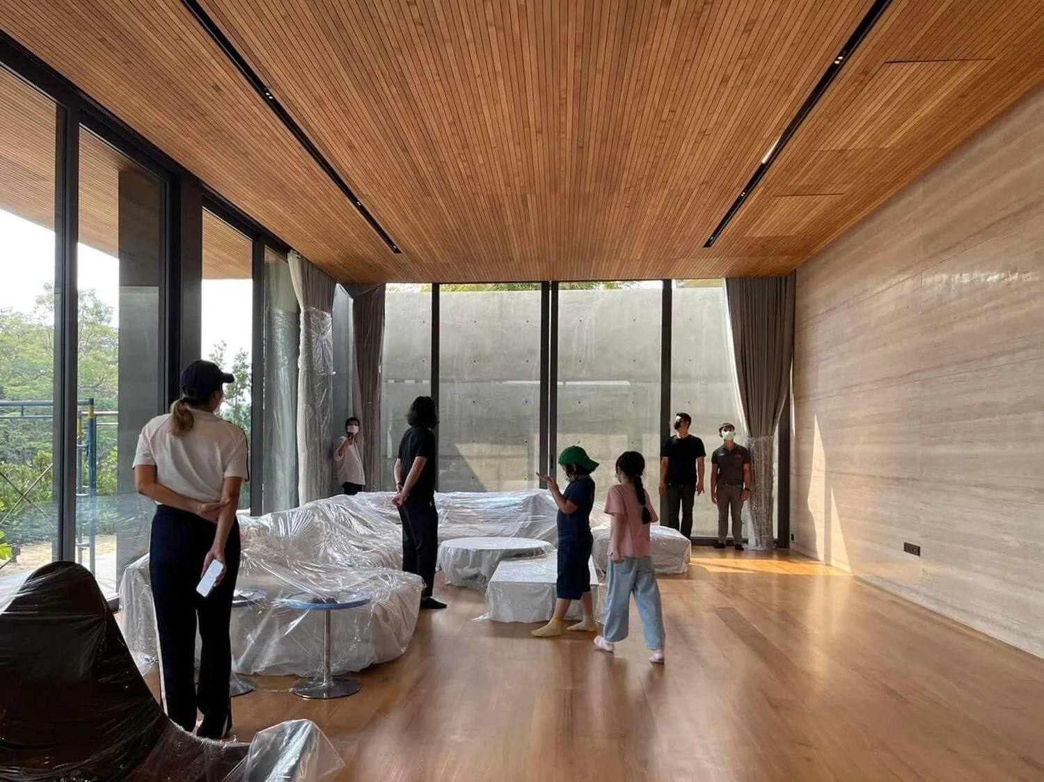 An open welcoming space beneath the wood ceiling