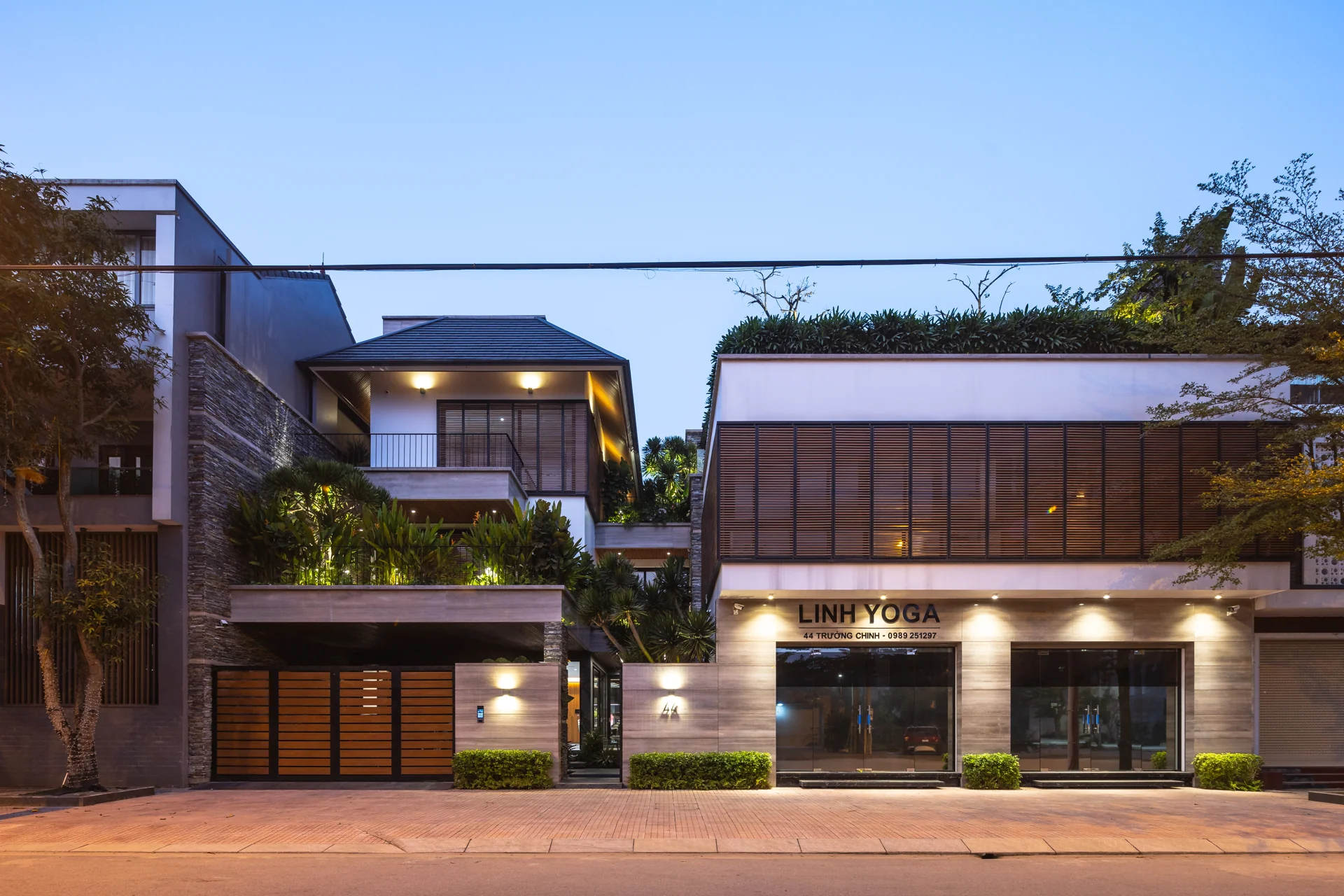 Villa 44 façade at dusk — Villa 44